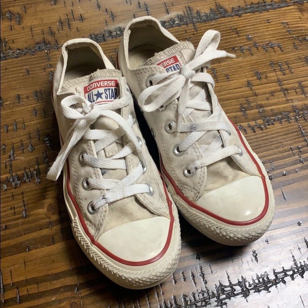Very worn white converse